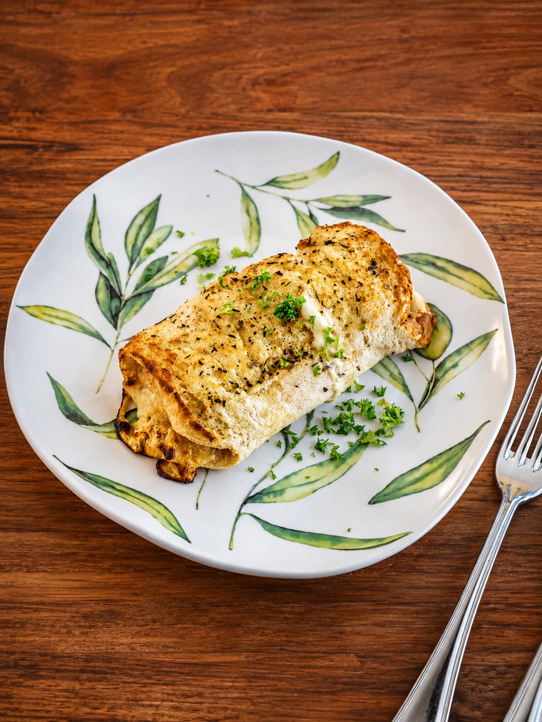 A toasted chicken panini at Māra Café