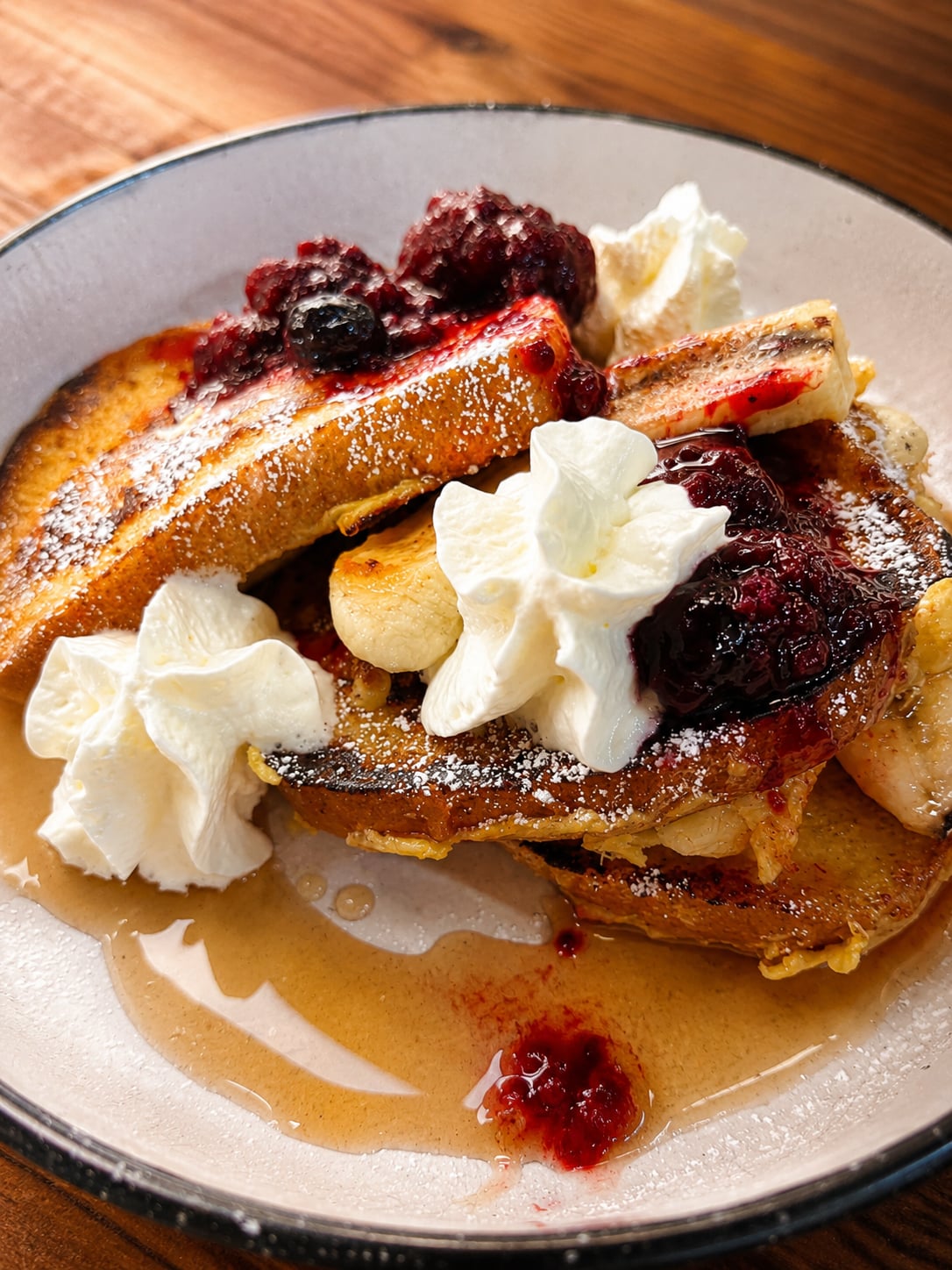 French toast with berries and cream at Māra Café